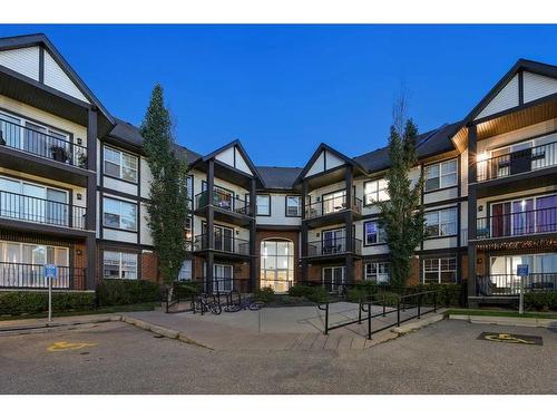 110-250 New Brighton Villas Se, Calgary, AB - Outdoor With Balcony With Facade