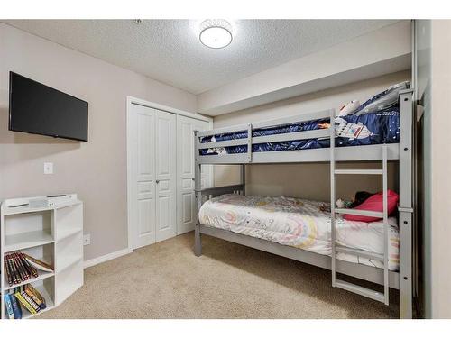 110-250 New Brighton Villas Se, Calgary, AB - Indoor Photo Showing Bedroom