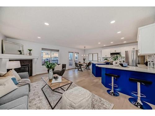 58 Kincora Manor Nw, Calgary, AB - Indoor Photo Showing Living Room With Fireplace