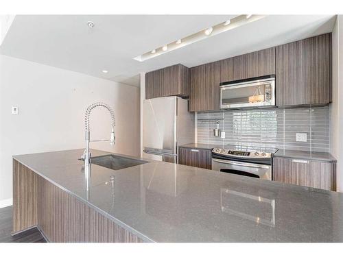 311-626 14 Avenue Sw, Calgary, AB - Indoor Photo Showing Kitchen With Stainless Steel Kitchen With Upgraded Kitchen