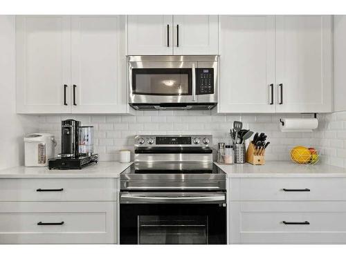 420 Harvest Grove Walk Ne, Calgary, AB - Indoor Photo Showing Kitchen With Double Sink With Upgraded Kitchen