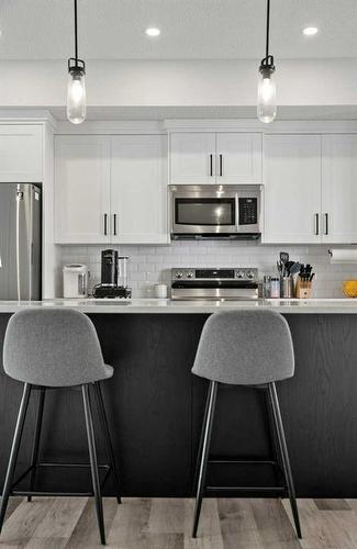 420 Harvest Grove Walk Ne, Calgary, AB - Indoor Photo Showing Kitchen With Stainless Steel Kitchen With Upgraded Kitchen