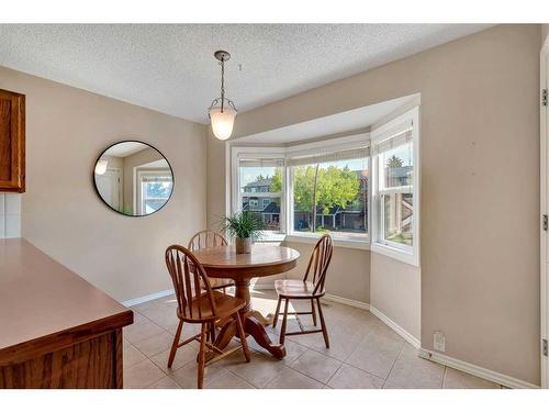 153 Woodglen Grove Sw, Calgary, AB - Indoor Photo Showing Dining Room