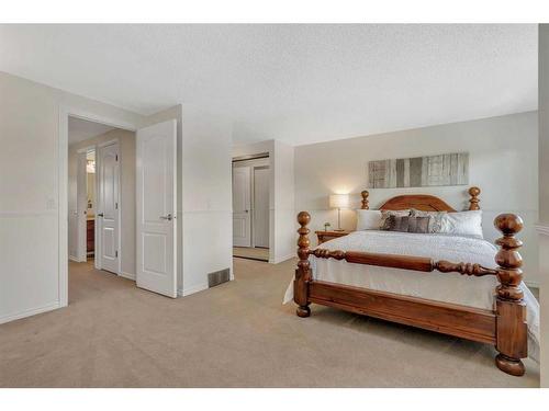 153 Woodglen Grove Sw, Calgary, AB - Indoor Photo Showing Bedroom