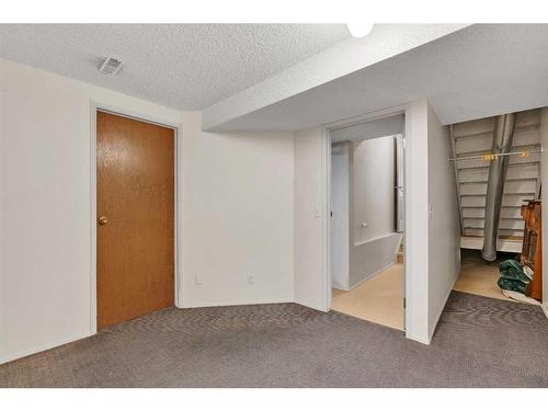 153 Woodglen Grove Sw, Calgary, AB - Indoor Photo Showing Other Room