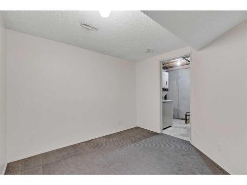 153 Woodglen Grove Sw, Calgary, AB - Indoor Photo Showing Other Room