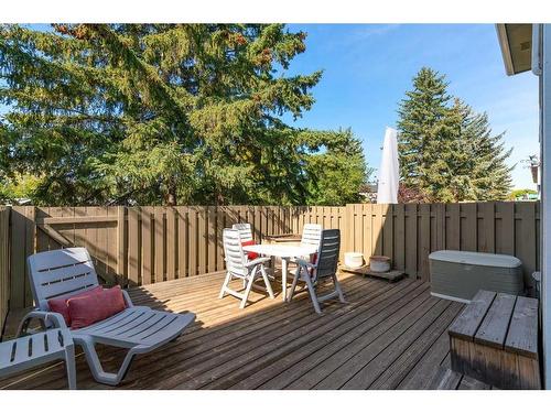 153 Woodglen Grove Sw, Calgary, AB - Outdoor With Deck Patio Veranda With Exterior