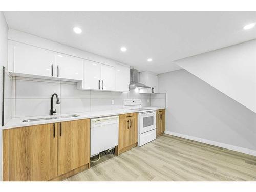 3239 Dovercliffe Road Se, Calgary, AB - Indoor Photo Showing Kitchen With Double Sink