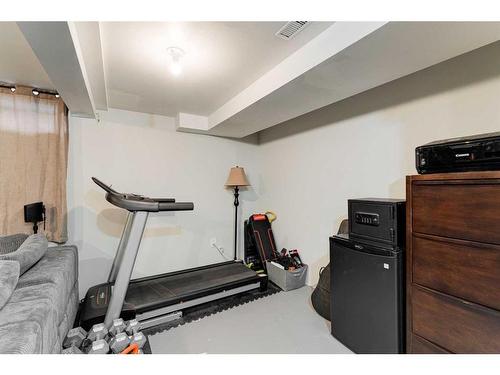 1502-544 Blackthorn Road Ne, Calgary, AB - Indoor Photo Showing Gym Room