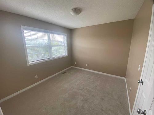 376 Silverado Drive Sw, Calgary, AB - Indoor Photo Showing Other Room