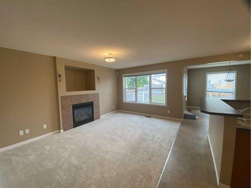 376 Silverado Drive Sw, Calgary, AB - Indoor With Fireplace