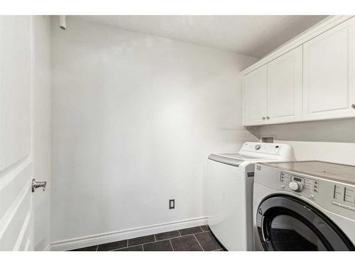 106-59 22 Avenue Sw, Calgary, AB - Indoor Photo Showing Laundry Room