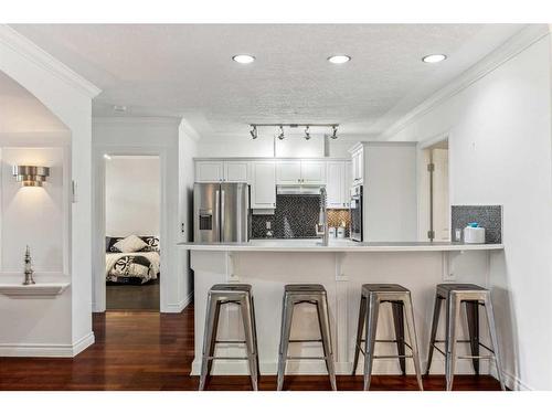 106-59 22 Avenue Sw, Calgary, AB - Indoor Photo Showing Kitchen With Upgraded Kitchen