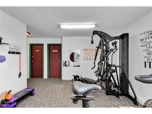 321-550 Westwood Drive Sw, Calgary, AB - Indoor Photo Showing Gym Room