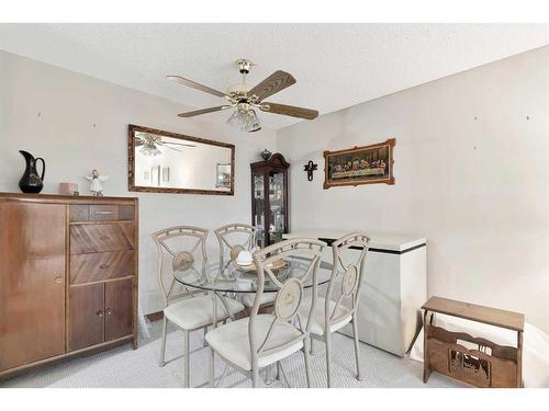 321-550 Westwood Drive Sw, Calgary, AB - Indoor Photo Showing Dining Room