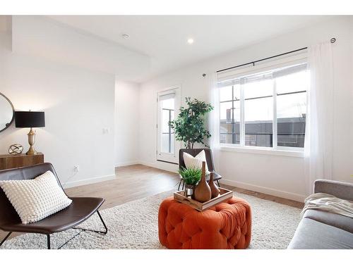 803-280 Chelsea Road, Chestermere, AB - Indoor Photo Showing Living Room