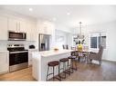 803-280 Chelsea Road, Chestermere, AB  - Indoor Photo Showing Kitchen With Stainless Steel Kitchen With Upgraded Kitchen 