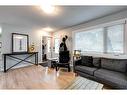 628 Aurora Place Se, Calgary, AB  - Indoor Photo Showing Living Room 