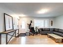 628 Aurora Place Se, Calgary, AB  - Indoor Photo Showing Living Room 