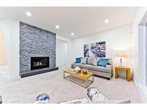 135 Elbow River Road, Rural Rocky View County, AB - Indoor Photo Showing Living Room With Fireplace