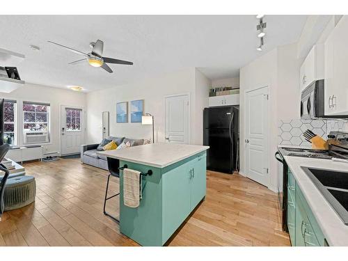 30 Auburn Bay Common Se, Calgary, AB - Indoor Photo Showing Kitchen With Double Sink