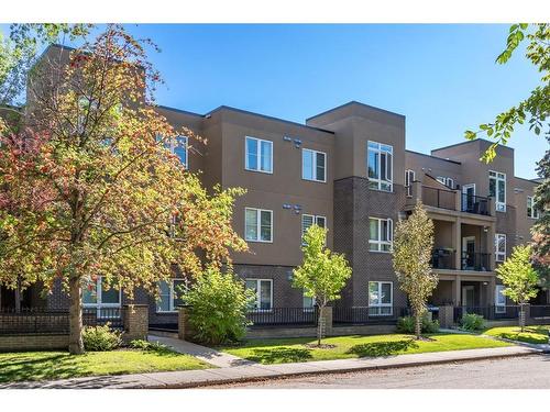 201-518 33 Street Nw, Calgary, AB - Outdoor With Balcony With Facade