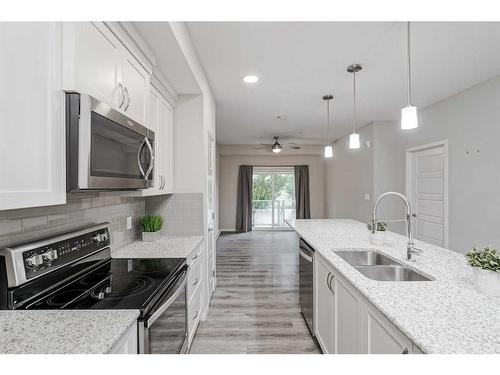 135-20 Seton Park Se, Calgary, AB - Indoor Photo Showing Kitchen With Double Sink With Upgraded Kitchen