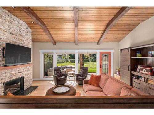 257-20 Midpark Crescent Se, Calgary, AB - Indoor Photo Showing Living Room With Fireplace