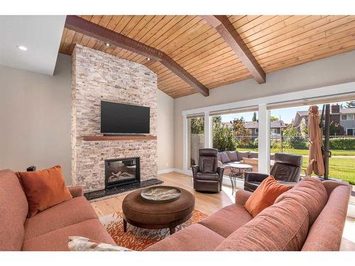 257-20 Midpark Crescent Se, Calgary, AB - Indoor Photo Showing Living Room With Fireplace