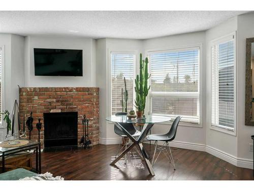 2374 17A Street Sw, Calgary, AB - Indoor With Fireplace