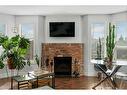 2374 17A Street Sw, Calgary, AB  - Indoor Photo Showing Living Room With Fireplace 