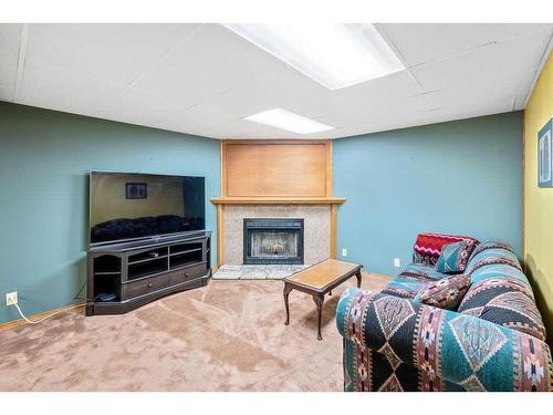 604 Cantrell Drive Sw, Calgary, AB - Indoor With Fireplace