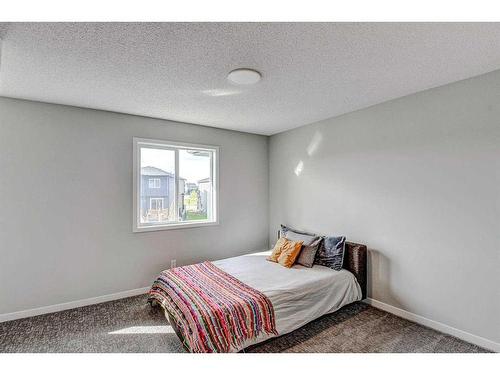 249 Creekside Boulevard, Calgary, AB - Indoor Photo Showing Bedroom