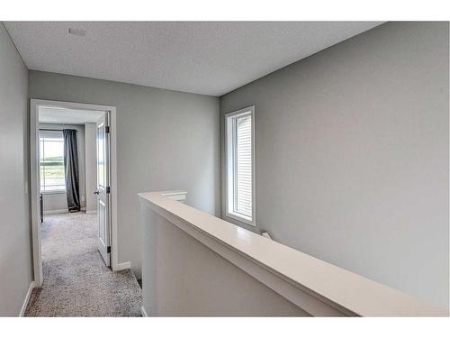 249 Creekside Boulevard, Calgary, AB - Indoor Photo Showing Other Room