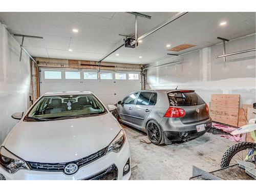 249 Creekside Boulevard, Calgary, AB - Indoor Photo Showing Garage