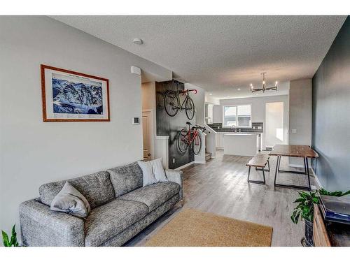 249 Creekside Boulevard, Calgary, AB - Indoor Photo Showing Living Room