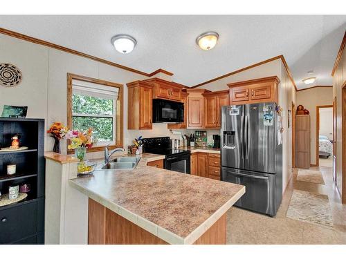 6B-10042 Township Road 422, Rural Ponoka County, AB - Indoor Photo Showing Kitchen With Double Sink