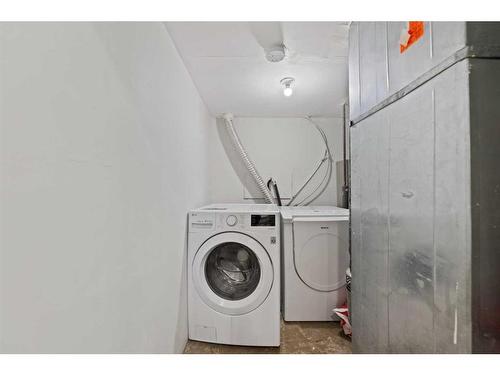 167 Saddlehorn Close Ne, Calgary, AB - Indoor Photo Showing Laundry Room