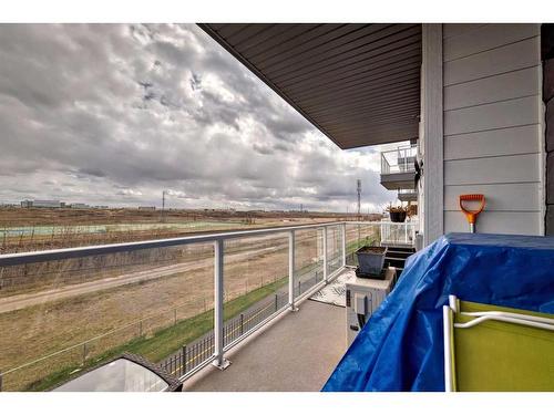 205-360 Harvest Hills Way Ne, Calgary, AB - Outdoor With Balcony With Exterior