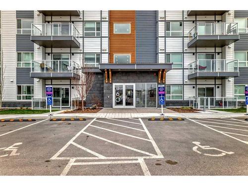 205-360 Harvest Hills Way Ne, Calgary, AB - Outdoor With Balcony With Facade