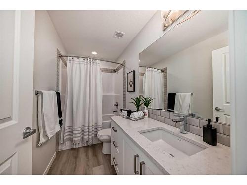 205-360 Harvest Hills Way Ne, Calgary, AB - Indoor Photo Showing Bathroom