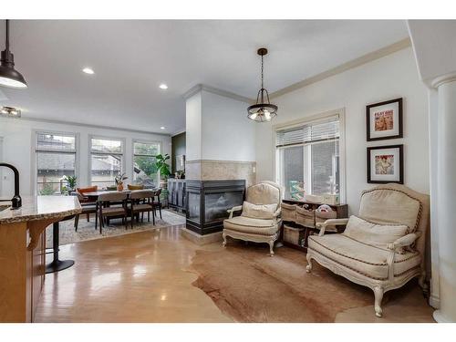 468 27 Avenue Nw, Calgary, AB - Indoor Photo Showing Living Room With Fireplace