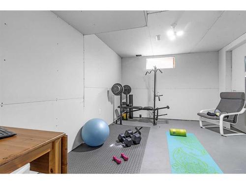 90 Deerpath Road Se, Calgary, AB - Indoor Photo Showing Gym Room