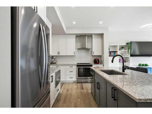 124 Masters Street Se, Calgary, AB - Indoor Photo Showing Kitchen With Stainless Steel Kitchen With Upgraded Kitchen