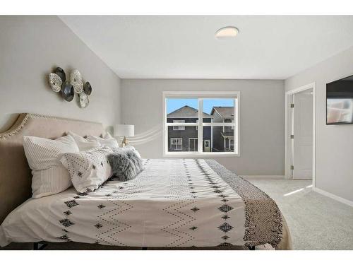 124 Masters Street Se, Calgary, AB - Indoor Photo Showing Bedroom