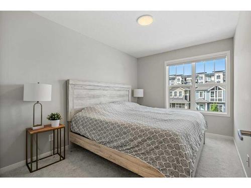 124 Masters Street Se, Calgary, AB - Indoor Photo Showing Bedroom