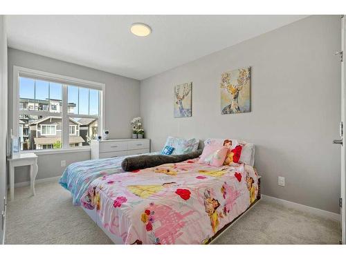 124 Masters Street Se, Calgary, AB - Indoor Photo Showing Bedroom