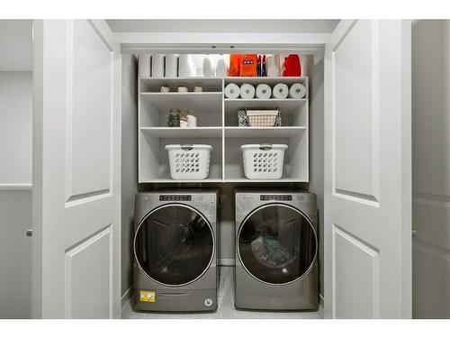 124 Masters Street Se, Calgary, AB - Indoor Photo Showing Laundry Room