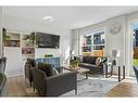 124 Masters Street Se, Calgary, AB  - Indoor Photo Showing Living Room 