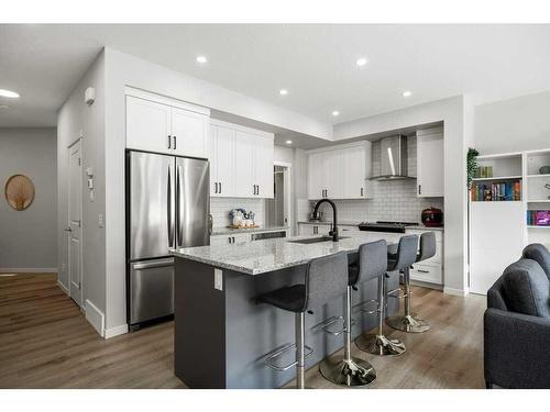 124 Masters Street Se, Calgary, AB - Indoor Photo Showing Kitchen With Stainless Steel Kitchen With Upgraded Kitchen